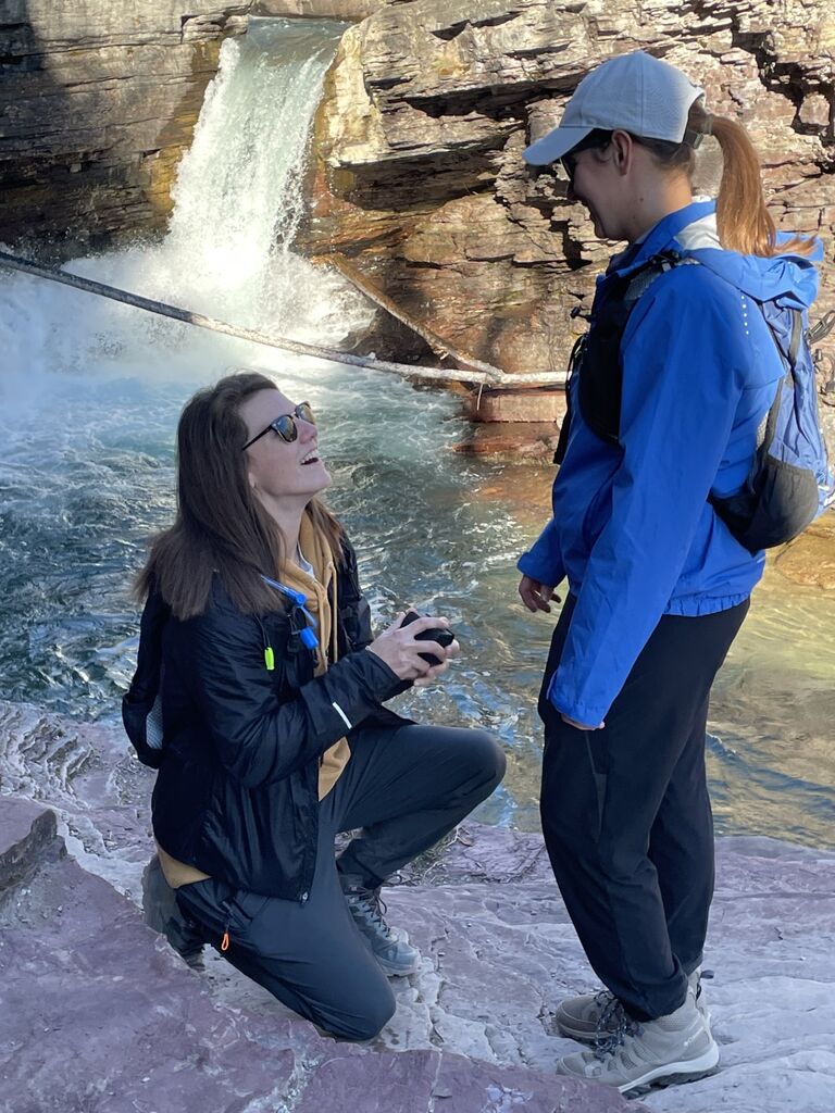We are engaged! Halea proposed to Erica in Glacier National Park in front of St. Mary Falls. She was surprised to say the least!
