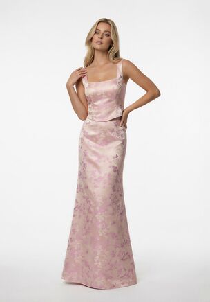 This A-line bridesmaid dress in Cecilia jacquard has a chic, on-trend two-piece look without the hassle of separates. The square neckline with straps adds a modern, youthful vibe, while the natural waist keeps the silhouette flattering and flowy. Stylish, playful, and effortlessly elegant, it’s perfect for a bridal party that wants a contemporary twist on a classic shape.
