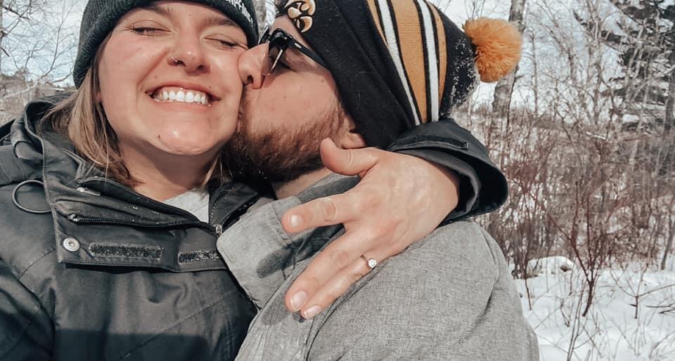 It's a yes! We were getting ready to head out to walk around Gooseberry Falls State Park in -17 degree weather. Emma was laying on Ben's jacket, felt the ring box in his coat pocket, and told him he needed to ask before they left or she was going to throw up. 