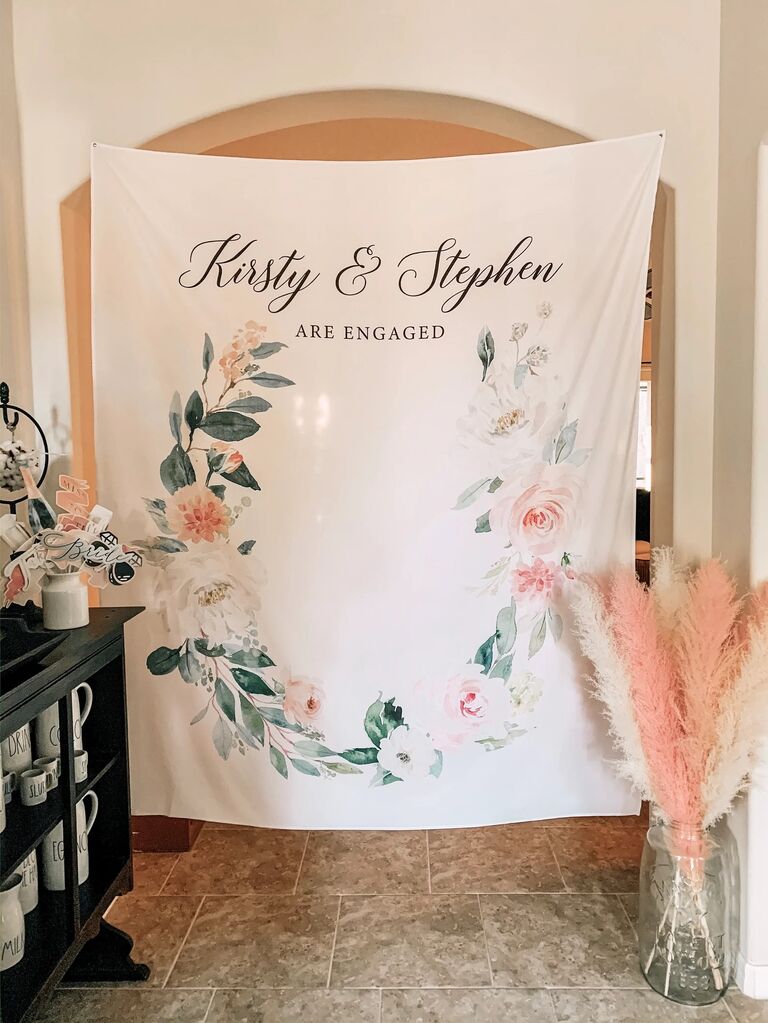 Personalized floral engagement party backdrop