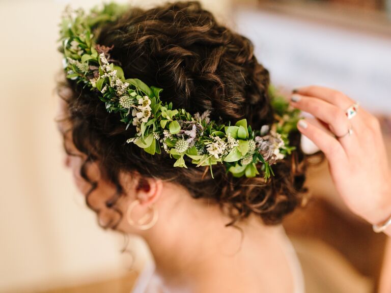 Bride wearing a flower crown.