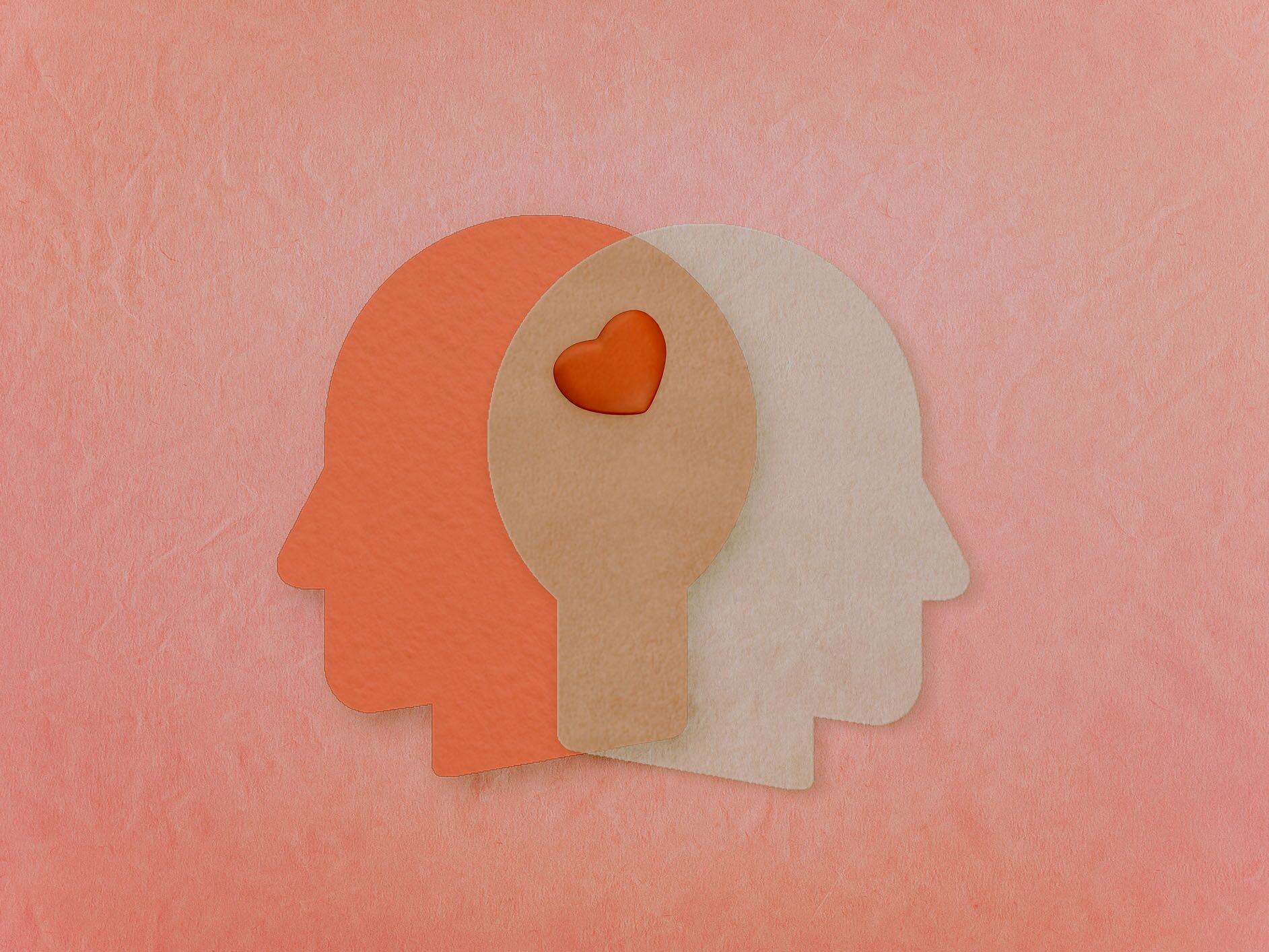 Two abstract heads with a heart shape connecting them 