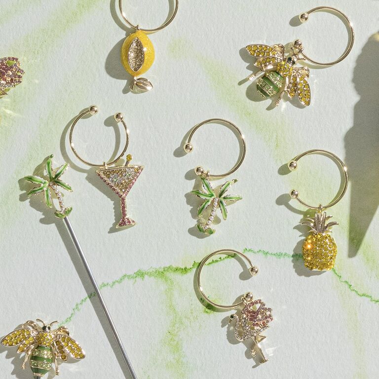 Thematic wine charms