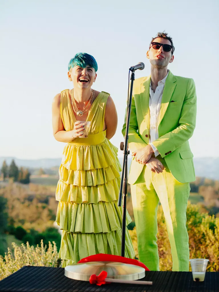 Couple in Neon Charteuse Outfits at Wedding Welcome Party
