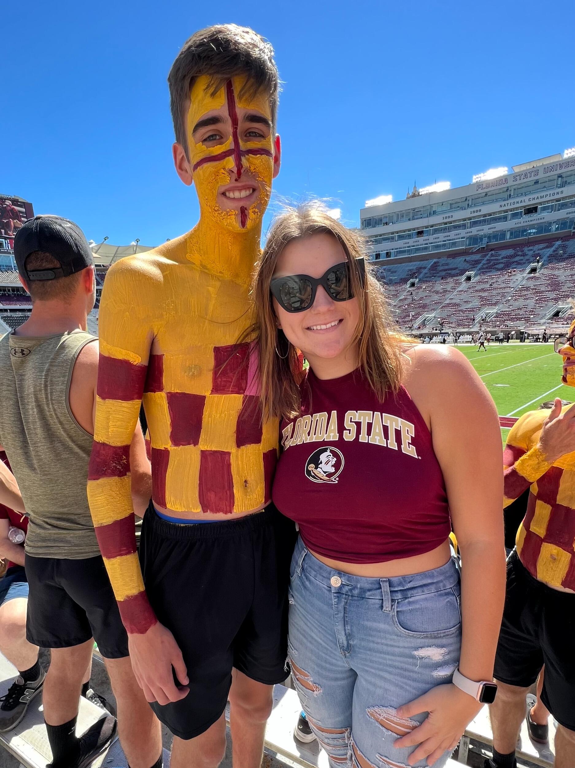 Then she joined him for a football game...  Colby always paints up with the Checker Boys for FSU football!