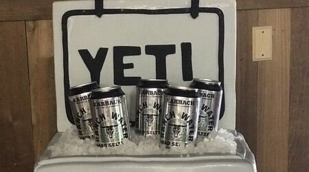 Yeti Cooler shaped grooms cake with cans and logos