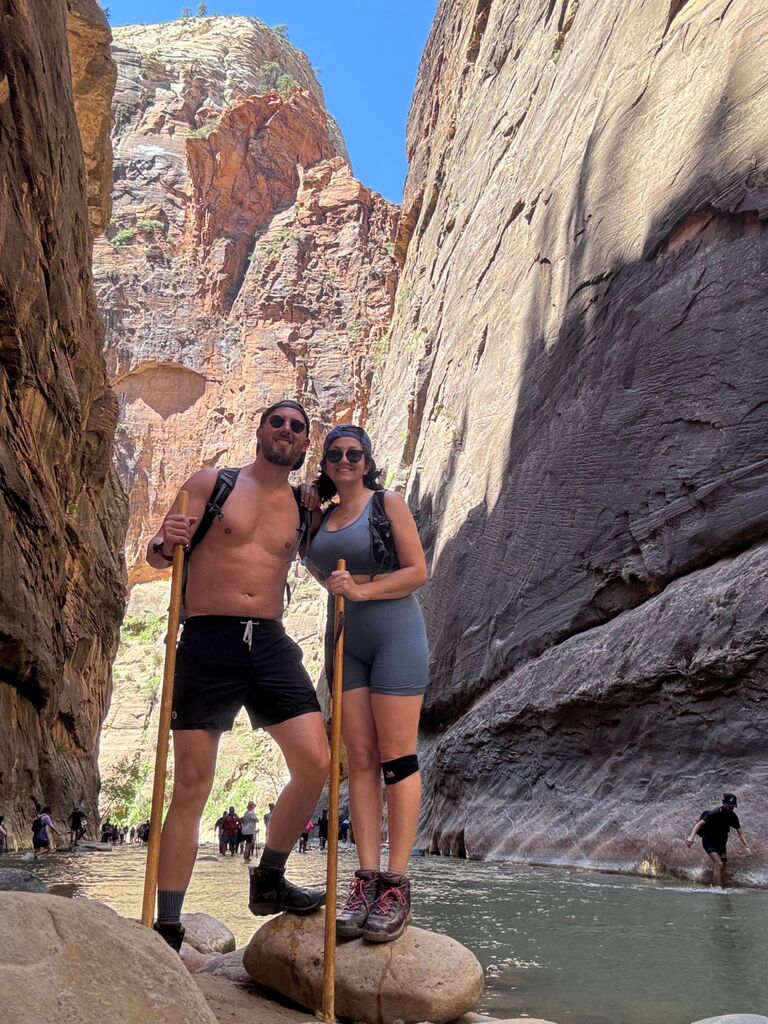 One of their most memorable adventures was camping in Zion National Park. Here, they were hiking "The Narrows" and enjoying the other-worldly landscape.