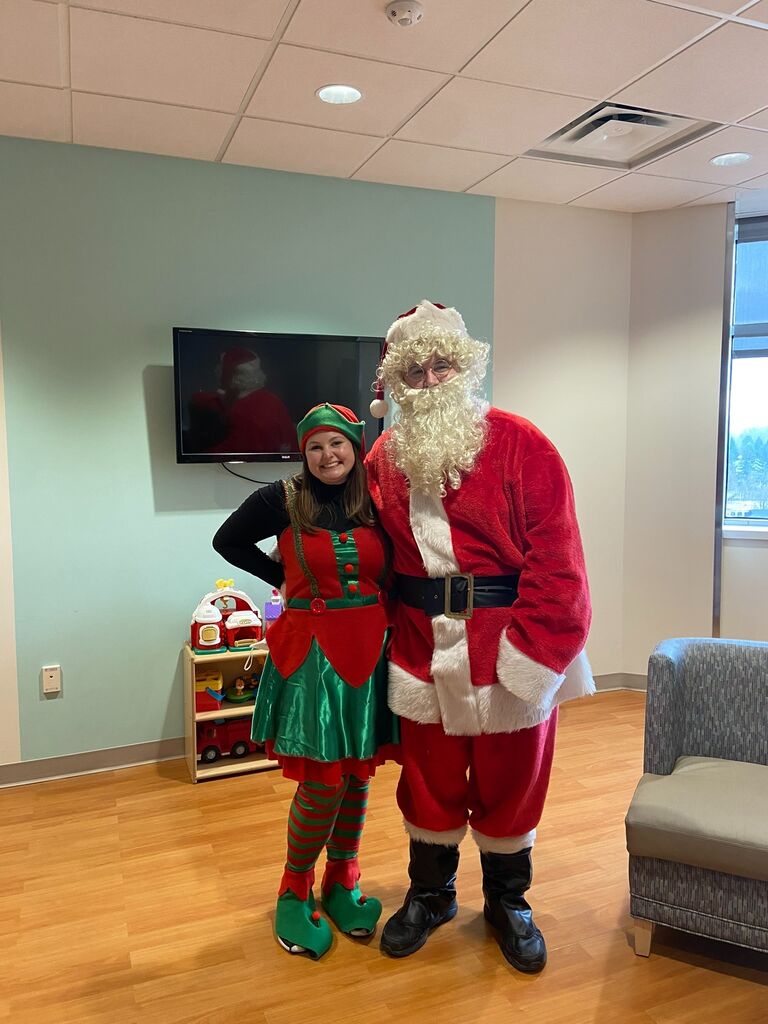 Mike has to work on Christmas, so Mike and Megan dressed up as Santa and an elf for the children's hospital.
