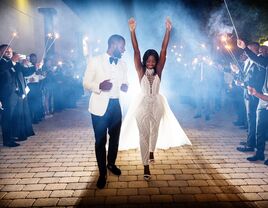 Couple leaving wedding reception