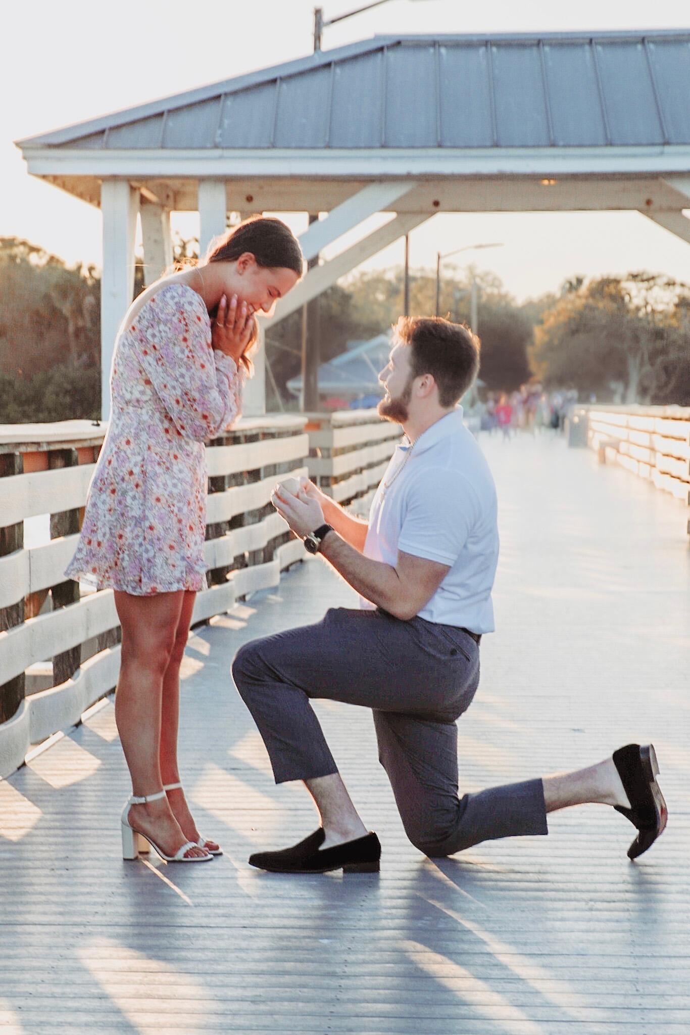 The "YES" day. Tim proposed to Trinity at Ballast Point Pier.