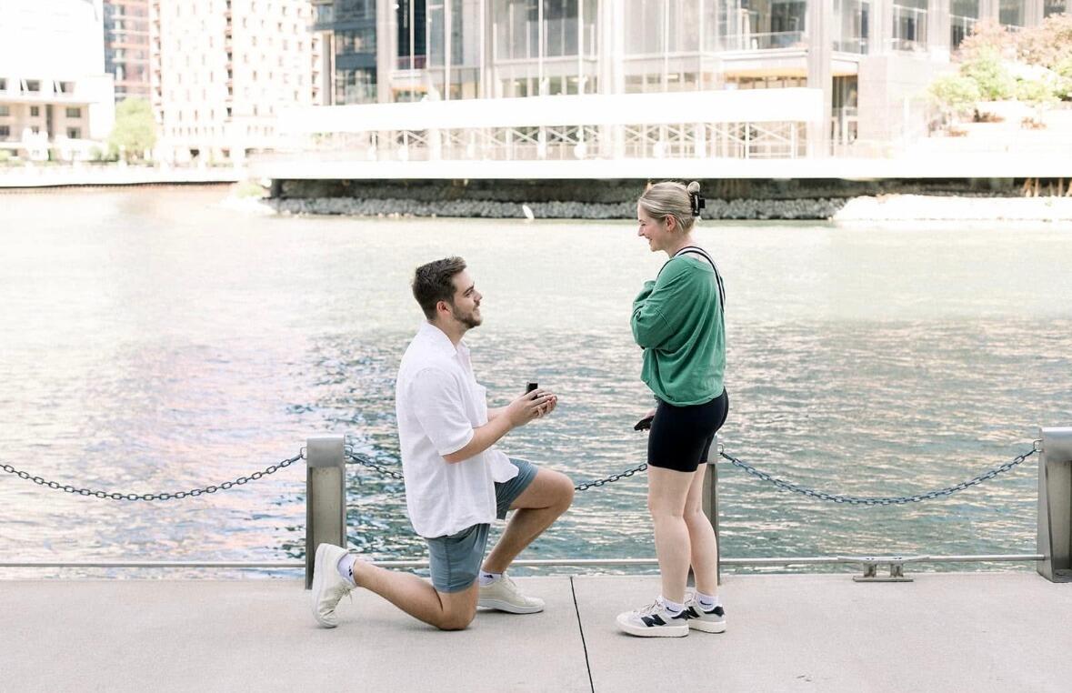 Christian proposed on the Riverwalk in Chicago, our favorite place to walk and chat on the weekends all year long. Anna said yes and our families and friends were there to celebrate. Right after this picture was taken, an architecture tour drove by and cheered us on. Pretty cool but you'd think maybe they'd give us free tickets for providing those patrons such a beautiful moment for free...