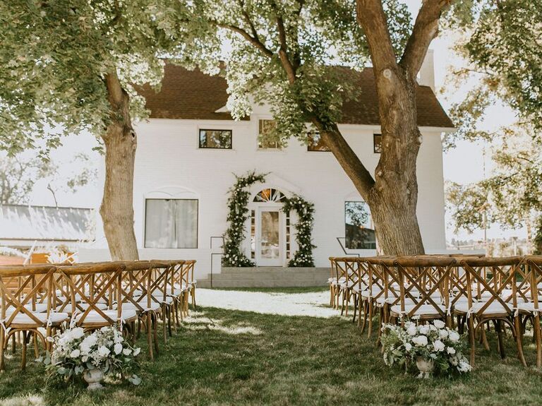Outside view of charming house and its ceremony site