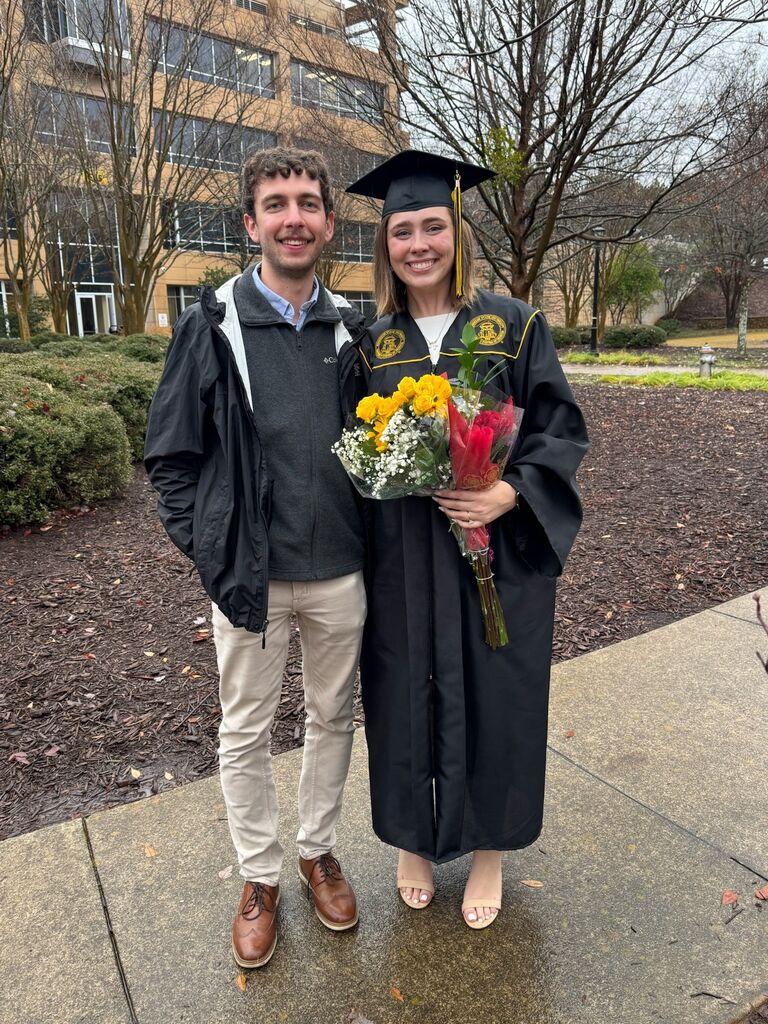 A couple months later, Priscilla graduated from Kennesaw State University. It was a proud moment for her, and Jaden was there to celebrate her achievement.