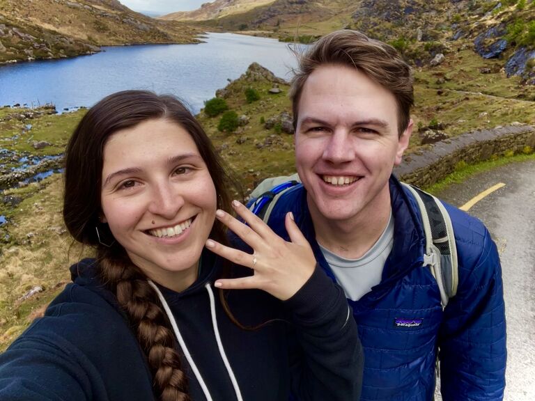 During our first international trip together, we stopped to take in the beautiful view while hiking in Killarney, Ireland. Nick chose this moment to get down on one knee in the mushy grass overlooking the majestic lake and propose to Nick, who was muttering profanities after recently battling to shove all our supplies back into a backpack. It was in this sweet, scenic, and somewhat sweaty moment that we got engaged.