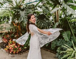 Bride wearing wedding dress with sleeves