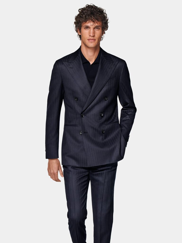 Herringbone navy suit by SuitSupply. 