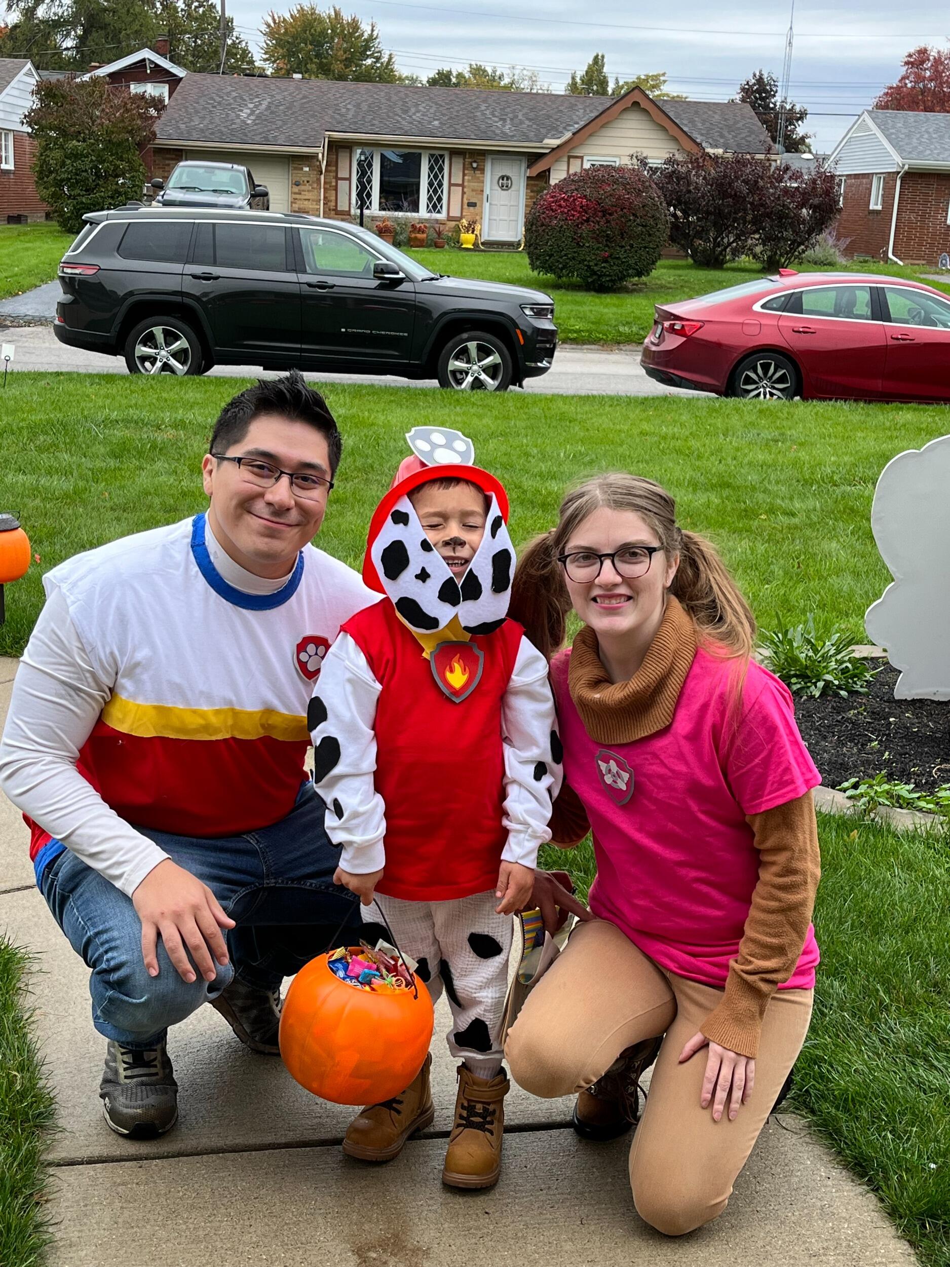 Octavio and Rachel took little Octavio trunk or treating for the first time. They dressed up as characters from little Octavio's favorite show Paw Patrol.