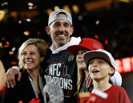 Kyle Shanahan with his wife Mandy Shanahan and their kids