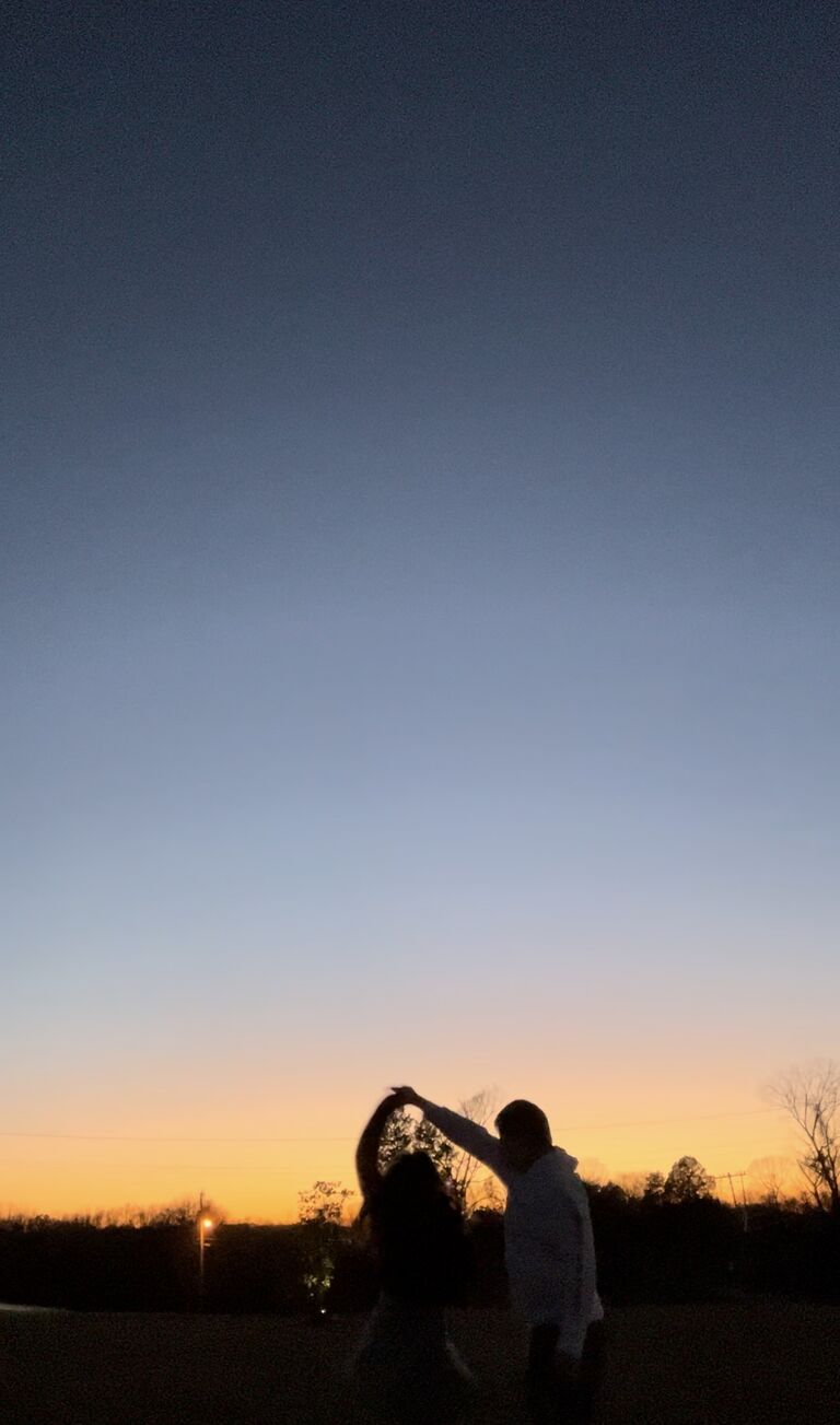 Us dancing during sunset in the outfit the bride would get proposed to in less than a year 