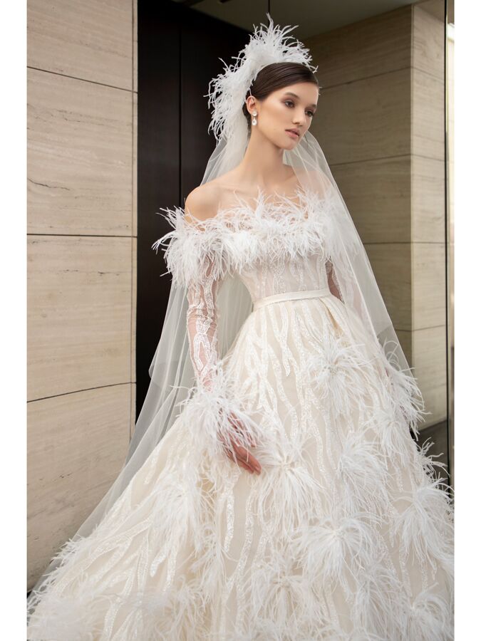 Lebanese designer Elie Saab made bridal gown for Jordanian royal
