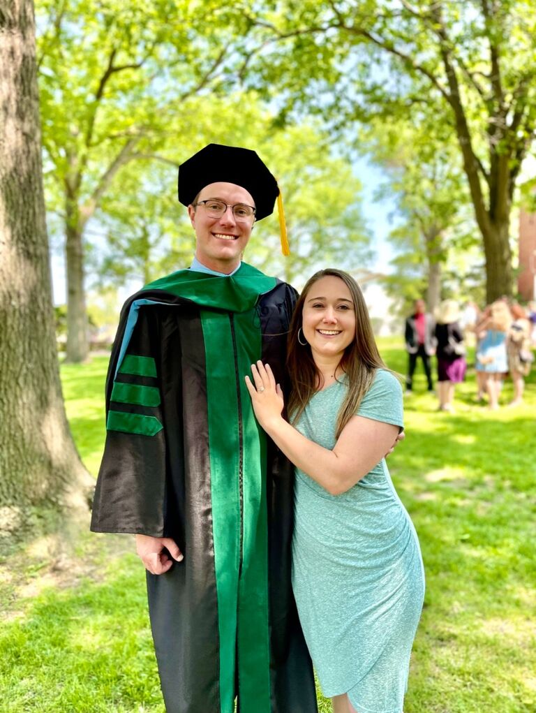 After the graduation ceremony in Kirksville. Andy is a doctor!