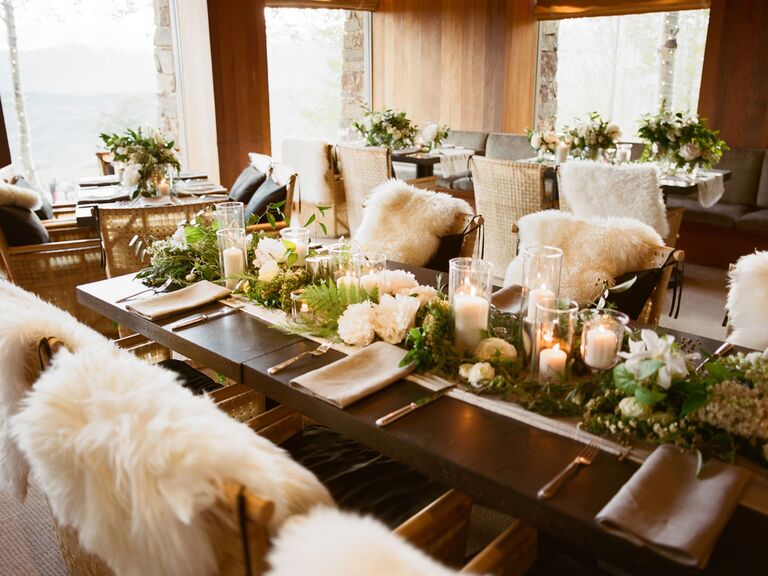 wedding reception table with faux fur throws