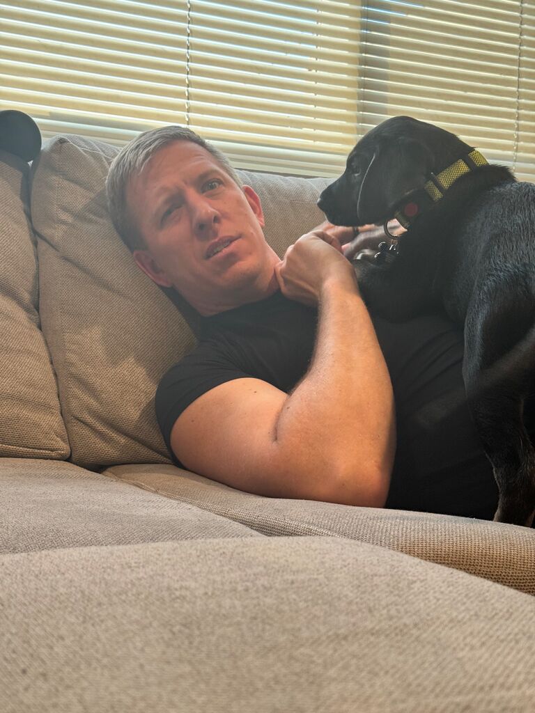 Our Lil Baer comes home. Chilling on the couch. 