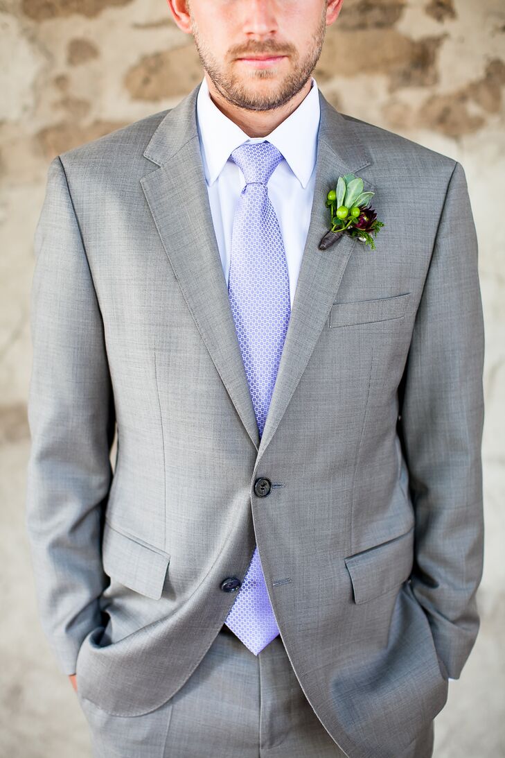Groom is Dressed in a Light Gray Suit with a Light Blue Tie