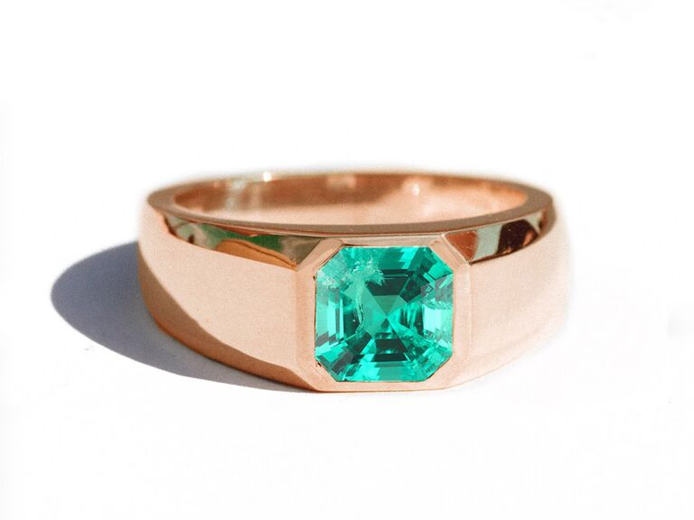 berlinger asscher cut engagement ring with emerald center stone and thick plain rose gold band