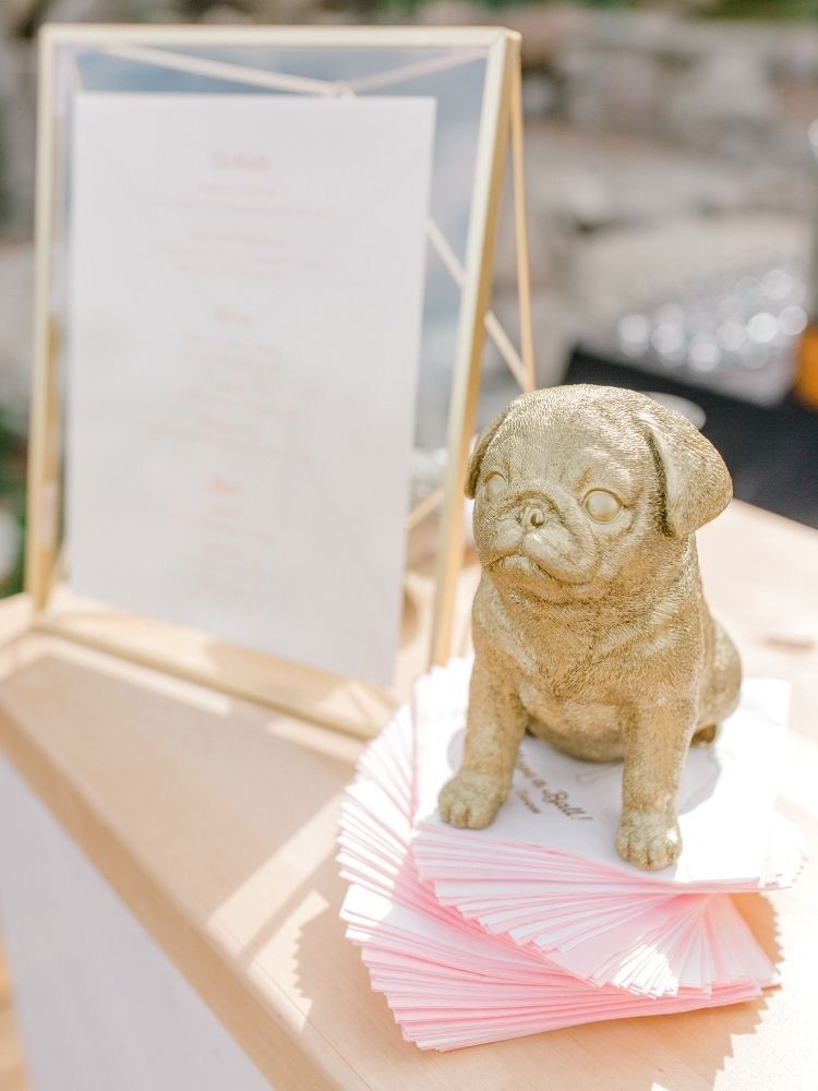 gold pug figurine as wedding decor