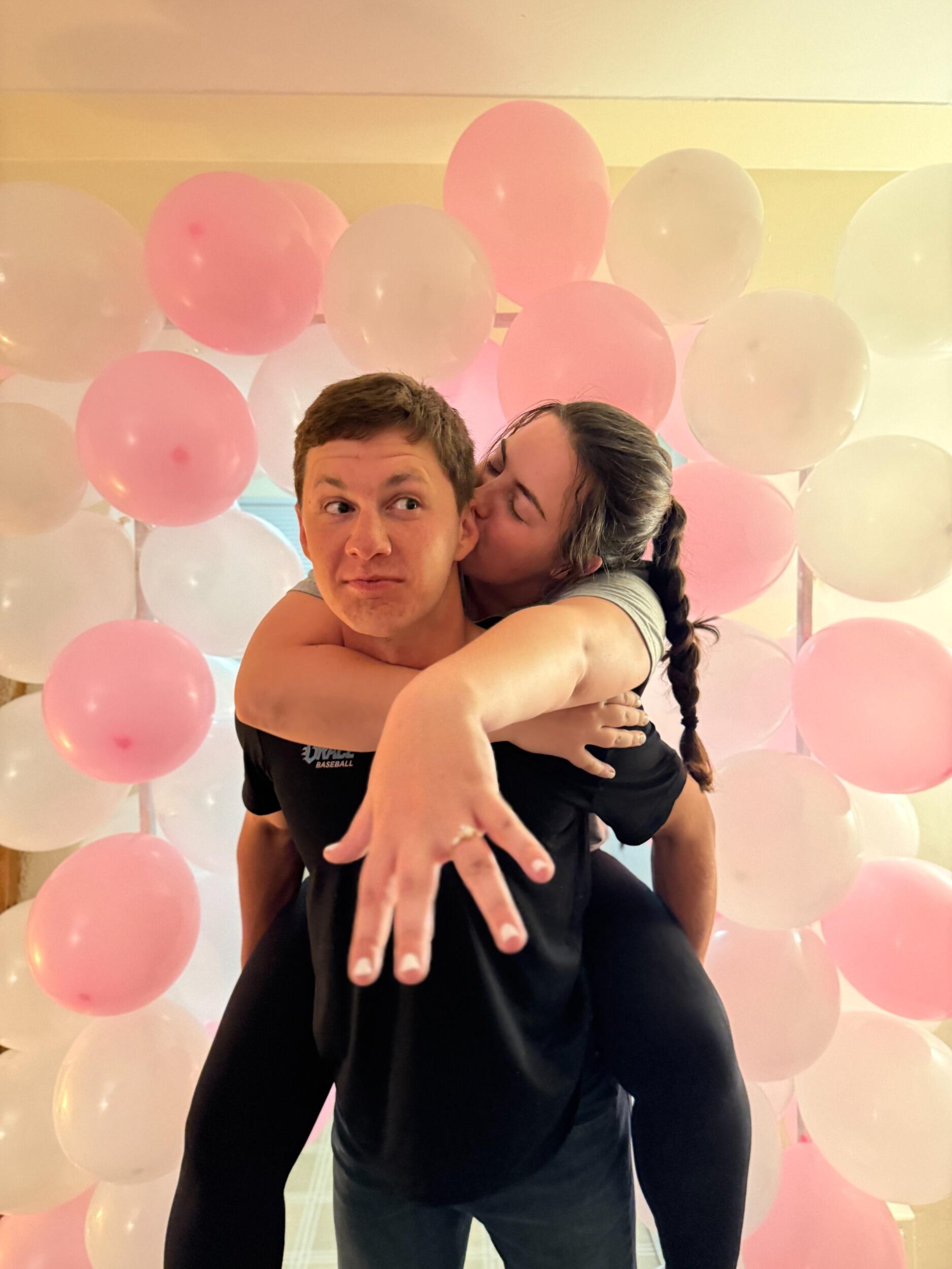 He popped the question!!!!!!!!! (After one of my volleyball games, I was a sweaty mess!) 
