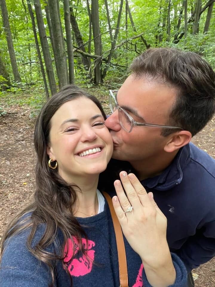 On a walk in Boyne City, Michigan, Jonathan gets on one knee and proposes. A full surprise of family (and friends!) to celebrate with the engaged couple. She said YES!