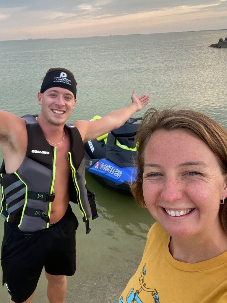As you know, Aaron lives in Holland and Jillian lives in Oregon—but that doesn’t stop them from making the most of summer! One of there favorite thing to do? Head to Maumee Bay to walk along the beach and just hang out.

One evening, Aaron calls Jillian with some exciting news: "I rode my jet ski from Perrysburg to Lake Erie... and now I’m at Maumee Bay!" Jillian, of course, didn’t hesitate. She hopped in her car and sped off to meet him at the beach.

It was the perfect impromptu evening—jet skis, sunsets, and the kind of spontaneous fun that makes memories. They spent the evening laughing, enjoying the waves, and celebrating just being together.

It was one of those nights that reminded them how much fun they can have when they’re together!
