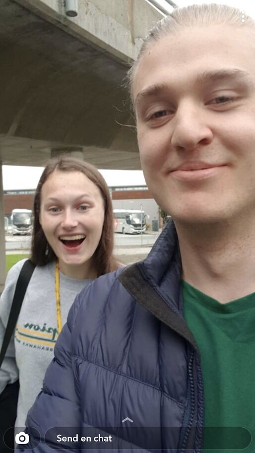 Our first picture together! Walking to the train to take us home from the airport. 