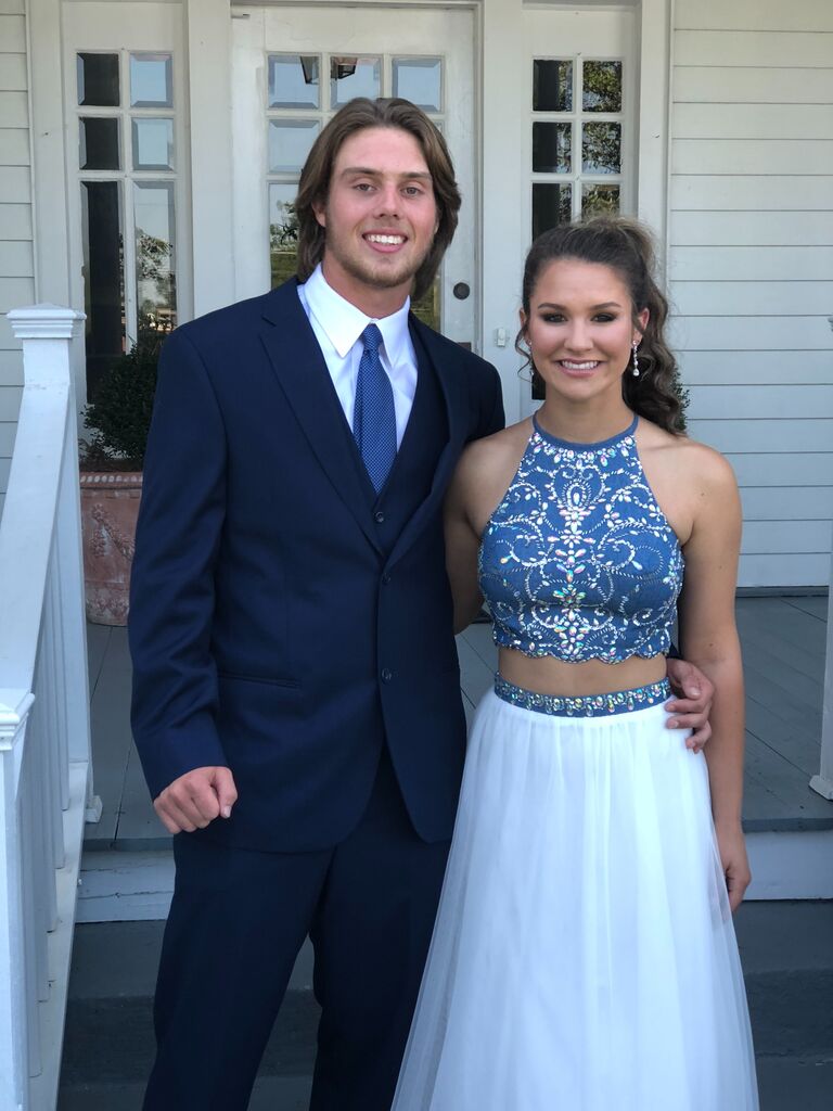 The following year consists of more firsts for Kris and Noah. This picture was taken at their first prom together. Little did they know, this would be the first of many dances they would have together. 