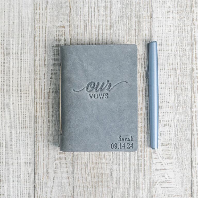 leather vow book embossed with our vows and the wedding date