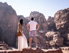 Well dressed couple looking at landscape in Jordan Things for couples to do in Jordan