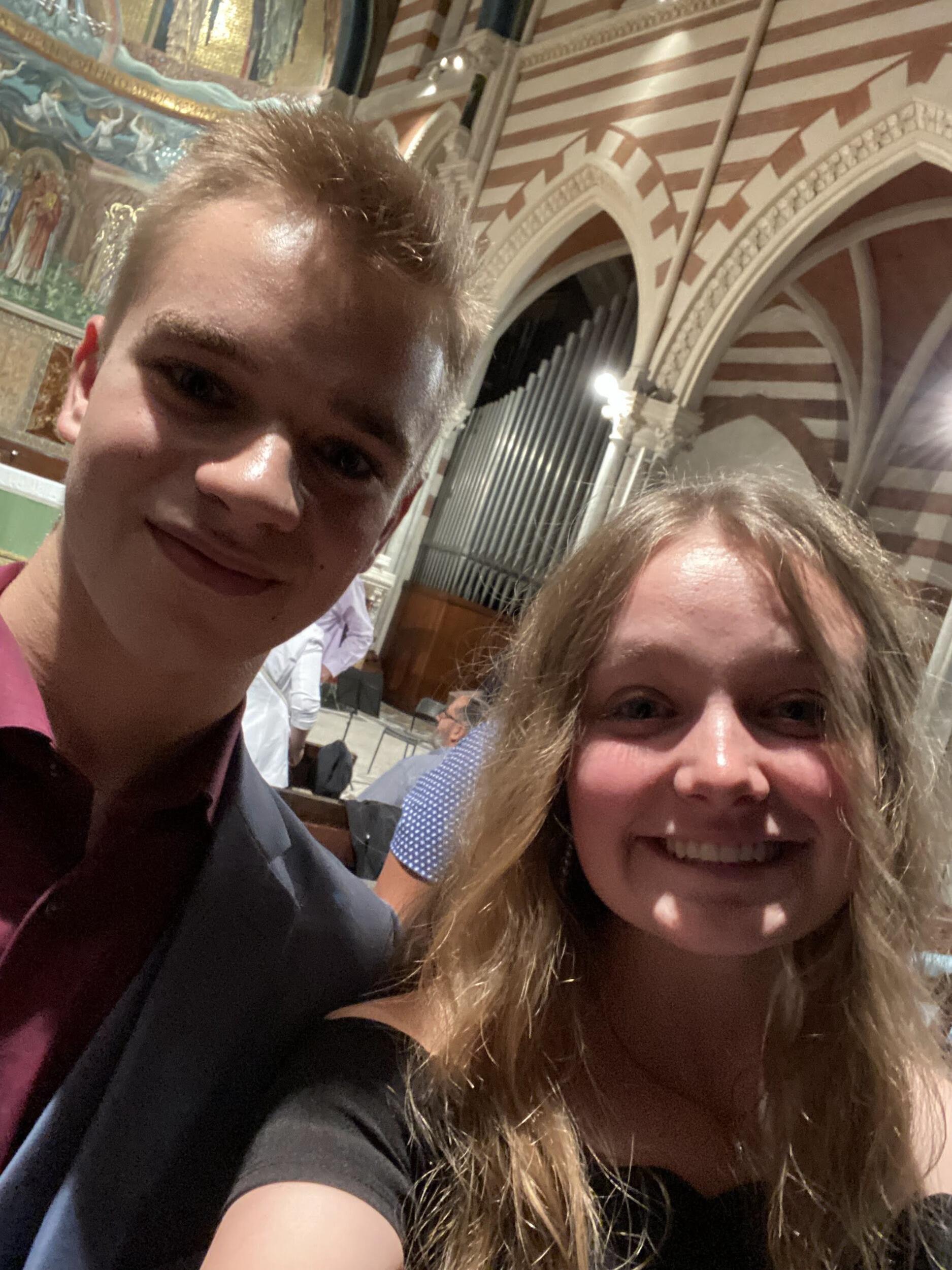 First date to a fancy dinner and symphony in a beautiful church in Rome.