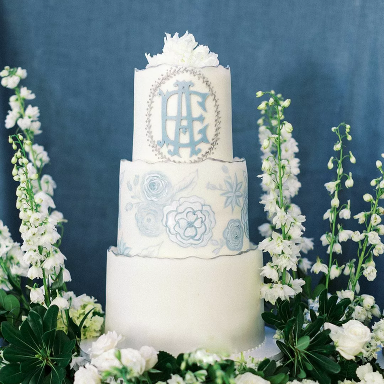 Blue and white tiered wedding cake