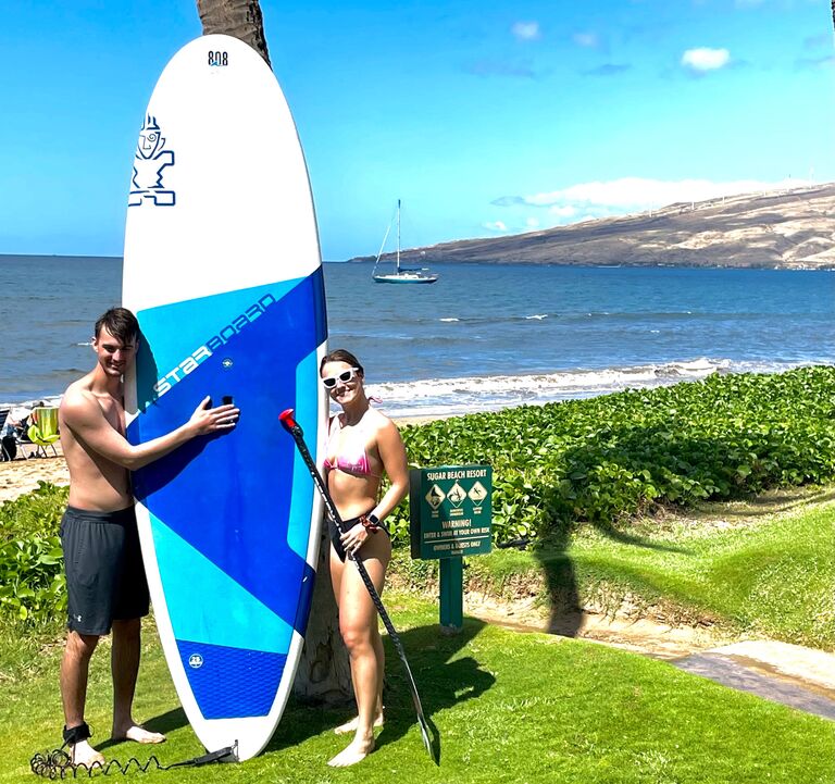 Paddle boarding in Maui. Liked it so much were going back for our honeymoon :)