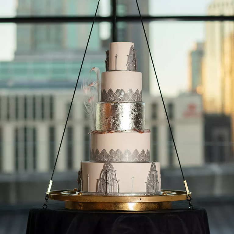 Silver and white art deco tiered wedding cake