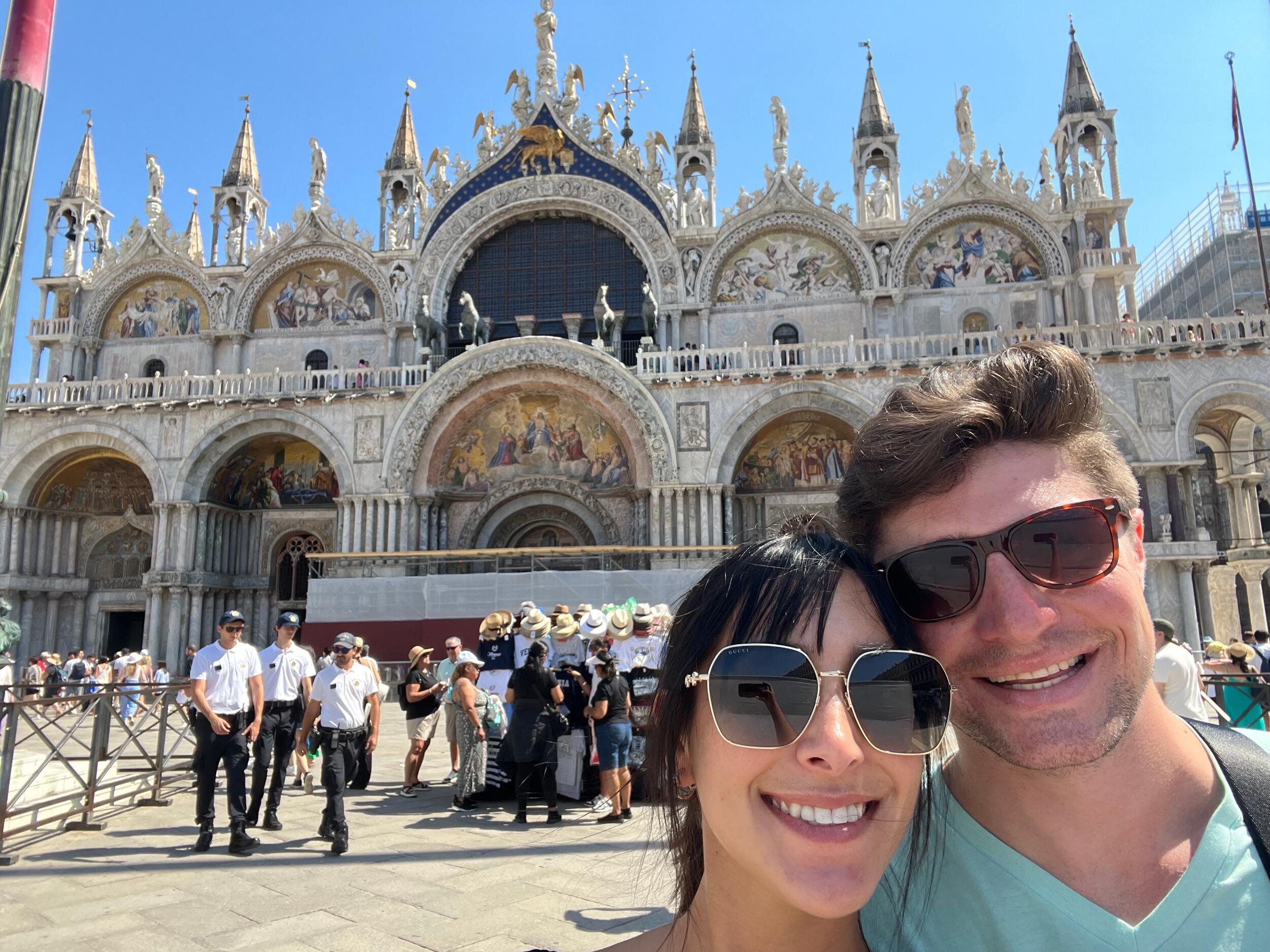 Stop 3 - Venice, Italy. The couple in the stunning Piazza San Marco!