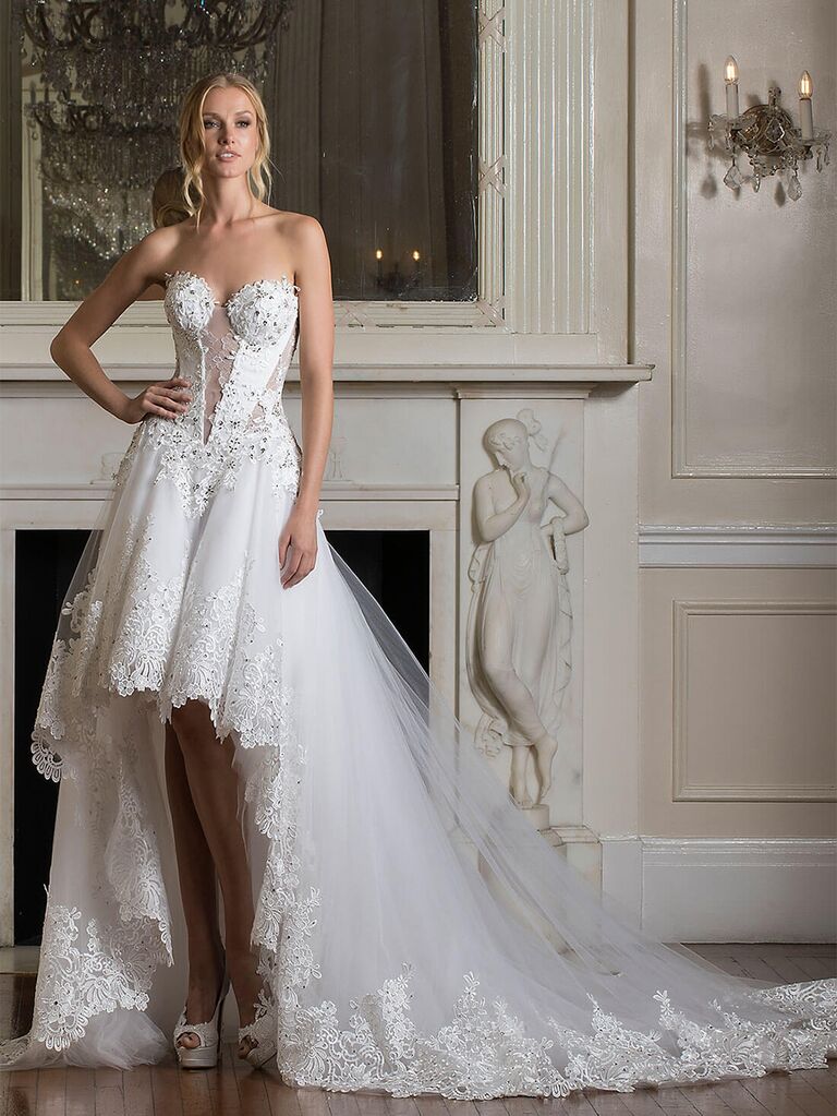 Sleeveless ball gown with long train and lace and embellishment details