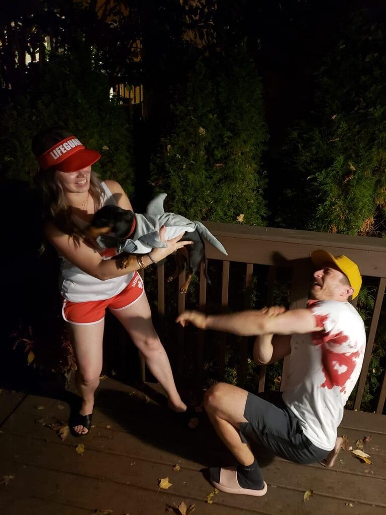 Lifeguard, shark, and shark attack victim for Halloween. Indi was displeased with the costume his humans smooshed him into. 