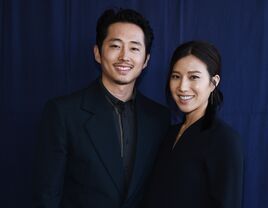 steven yeun wife joana pak in 2019 at the independent spirit awards