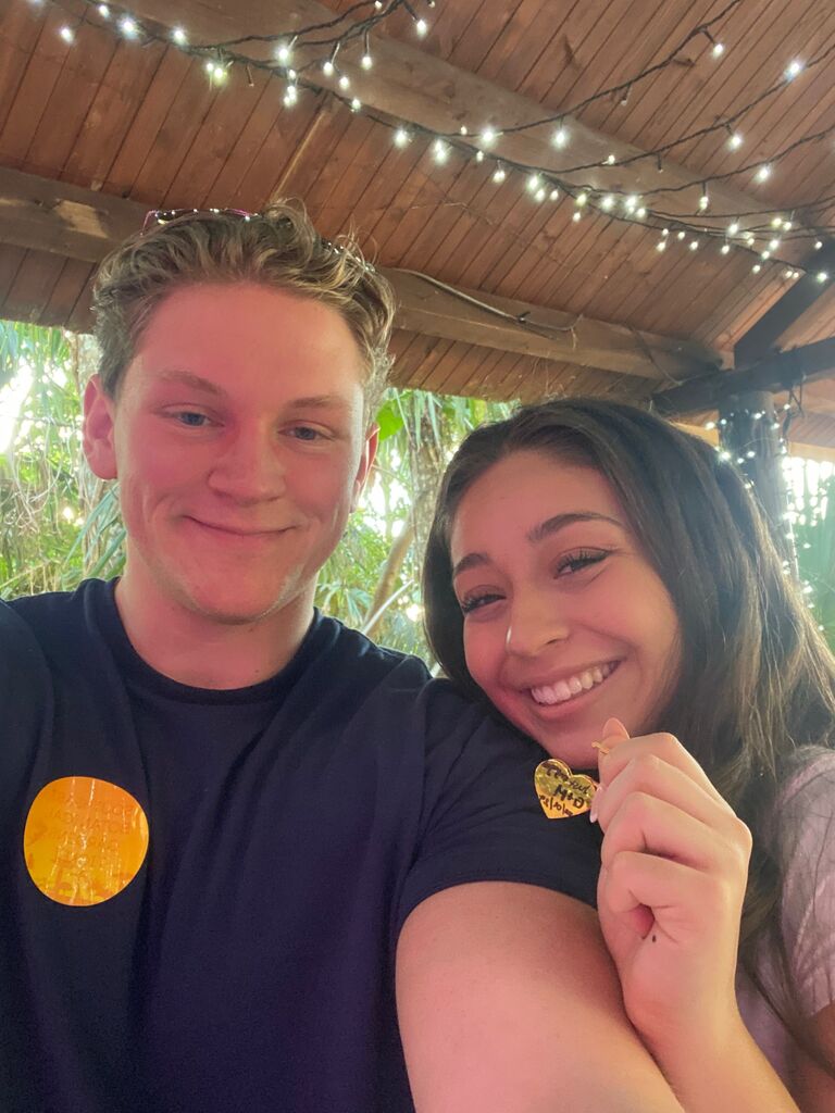 Visiting the botanical gardens in Okinawa, Japan and found a place to put a lock on a wall. We wrote "Just engaged 01/01/2024" on it - Gavin still wears the key around his neck to this day.