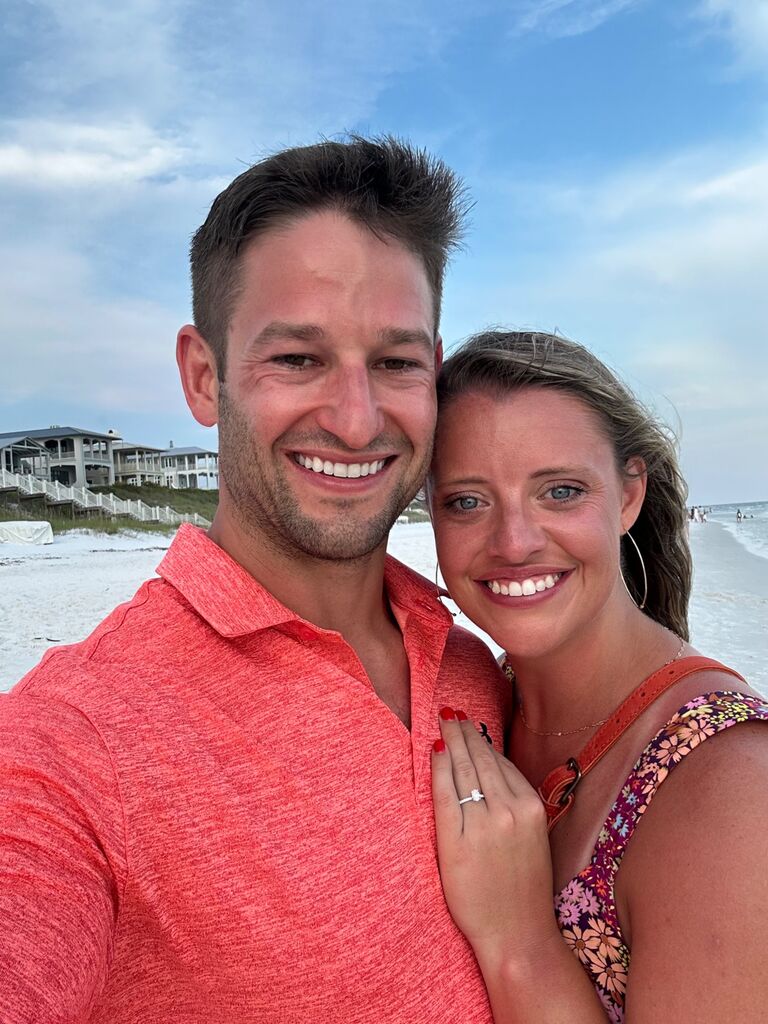 On a lovely evening in Seaside, FL, Tommy proposed & Sara said 'YES!'