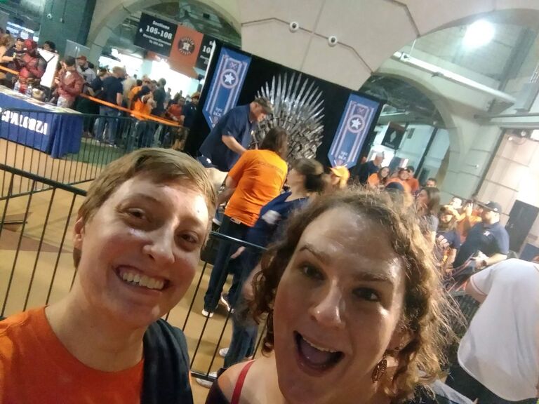 Justine and Tori take a picture with the Iron Throne at an Astros game