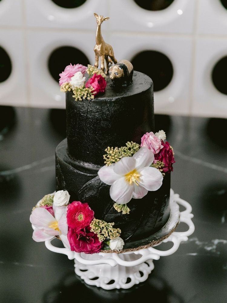 two-tier black wedding cake