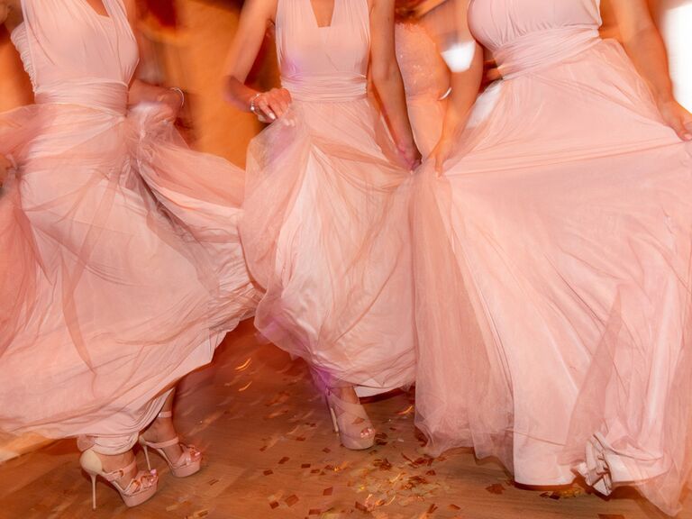 Bridesmaids dancing to upbeat wedding entrance song